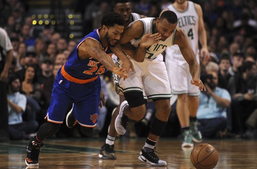 Nov 11, 2016; Boston, MA, USA; New York Knicks guard Derrick Rose (25) and Boston Celtics guard Avery Bradley (0) battle for a loose ball during the second half at TD Garden. Mandatory Credit: Bob DeChiara-USA TODAY Sports