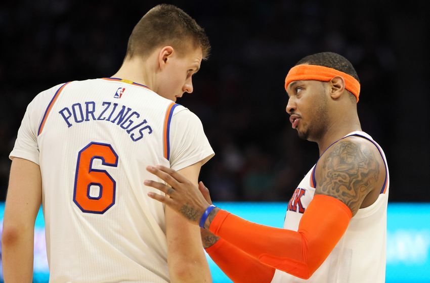 Dec 9, 2016; Sacramento, CA, USA; New York Knicks forward Carmelo Anthony (7) talks with forward Kristaps Porzingis (6) during the second half at Golden 1 Center. The Knicks defeated the Kings 103-100. Mandatory Credit: Sergio Estrada-USA TODAY Sports