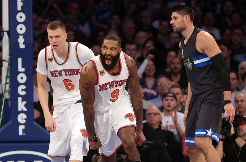 Dec 22, 2016; New York, NY, USA; New York Knicks center Kyle O'Quinn (9) reacts after a dunk against the Orlando Magic during the second quarter at Madison Square Garden. Mandatory Credit: Brad Penner-USA TODAY Sports