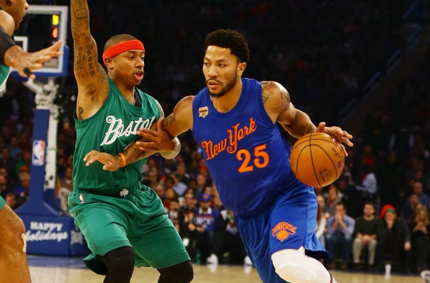 Dec 25, 2016; New York, NY, USA; New York Knicks guard Derrick Rose (25) dribbles the ball while being defended by Boston Celtics guard Isaiah Thomas (4) during the first half at Madison Square Garden. Mandatory Credit: Andy Marlin-USA TODAY Sports