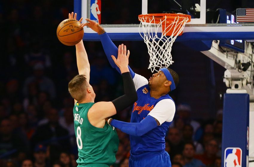 Dec 25, 2016; New York, NY, USA; New York Knicks forward Carmelo Anthony (7) blocks a shot by by Boston Celtics forward Jonas Jerebko (8) during the first half at Madison Square Garden. Mandatory Credit: Andy Marlin-USA TODAY Sports