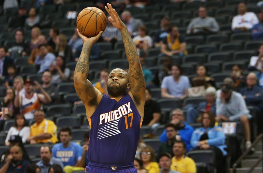 Nov 16, 2016; Denver, CO, USA; Phoenix Suns forward P.J. Tucker (17) shoots the ball during the first half against the Denver Nuggets at Pepsi Center. Mandatory Credit: Chris Humphreys-USA TODAY Sports