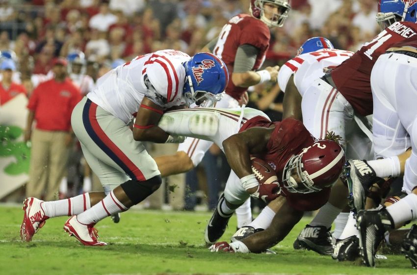 Sep 19, 2015; Tuscaloosa, AL, USA; Alabama Crimson Tide running back Derrick Henry (2) is hit by Mississippi Rebels defensive back Tony Conner (12)at Bryant-Denny Stadium. Mandatory Credit: Marvin Gentry-USA TODAY Sports