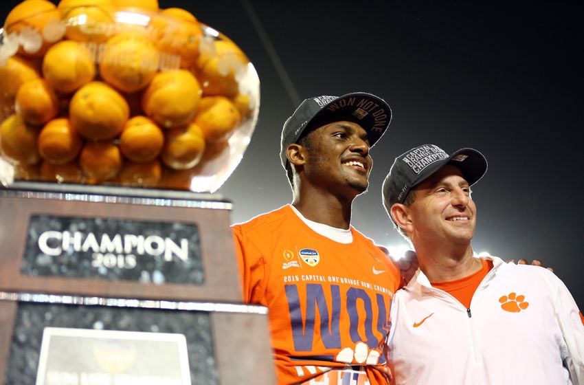 Dec 31, 2015; Miami Gardens, FL, USA; Clemson Tigers head coach Dabo Swinney and quarterback Deshaun Watson (4) celebrate after defeating Oklahoma Sooners in the 2015 CFP semifinal at the Orange Bowl at Sun Life Stadium. Clemson won 37-17. Mandatory Credit: Steve Mitchell-USA TODAY Sports