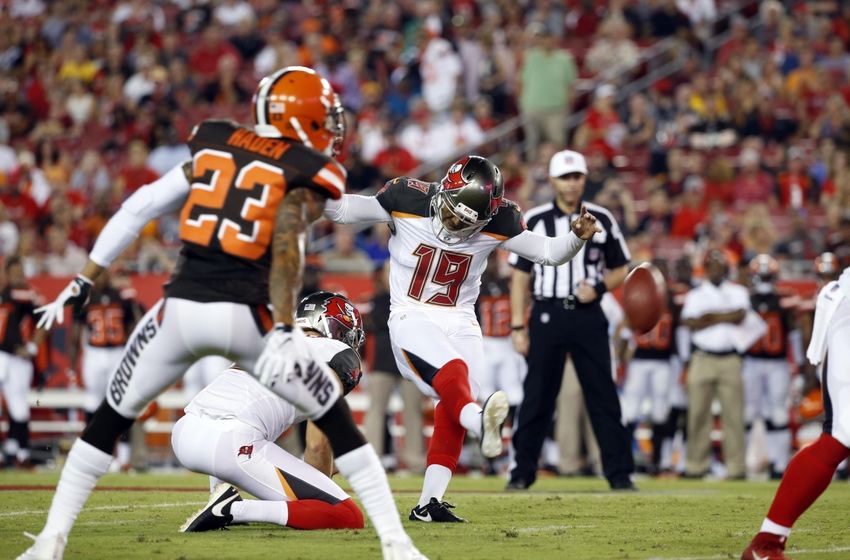 Aug 26, 2016; Tampa, FL, USA; Tampa Bay Buccaneers kicker Roberto Aguayo (19) kicks and makes a field goal as punter Bryan Anger (9) holds the ball against the Cleveland Browns during the first quarter at Raymond James Stadium. Mandatory Credit: Kim Klement-USA TODAY Sports