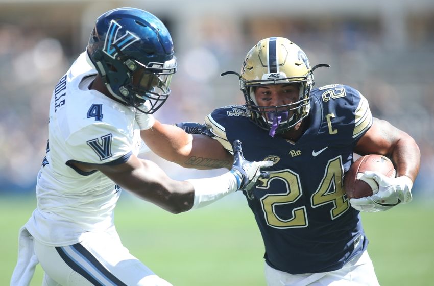 Sep 3, 2016; Pittsburgh, PA, USA; Pittsburgh Panthers running back James Conner (24) scores on a four yard touchdown run against defensive back Rob Rolle (4) during the second quarter at Heinz Field. Mandatory Credit: Charles LeClaire-USA TODAY Sports