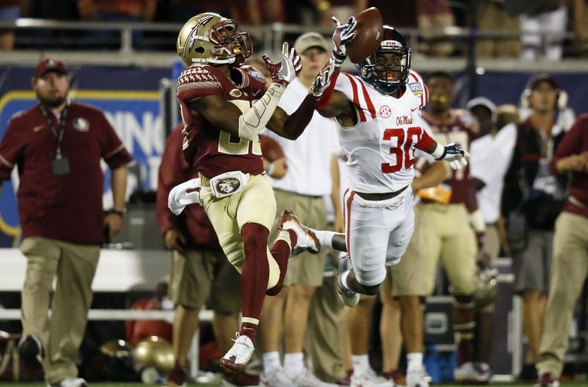 Sep 5, 2016; Orlando, FL, USA; Mississippi Rebels defensive back A.J. Moore (30) knocks the ball down from Florida State Seminoles wide receiver Nyqwan Murray (80) in the third quarter at Camping World Stadium. Florida State Seminoles won 45-34. Mandatory Credit: Logan Bowles-USA TODAY Sports