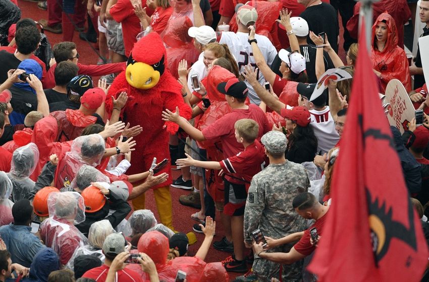 Sep 17, 2016; Louisville, KY, USA; The Louisville Cardinals mascot greets fans during the Card March before facing the Florida State Seminoles at Papa John's Cardinal Stadium. Mandatory Credit: Jamie Rhodes-USA TODAY Sports