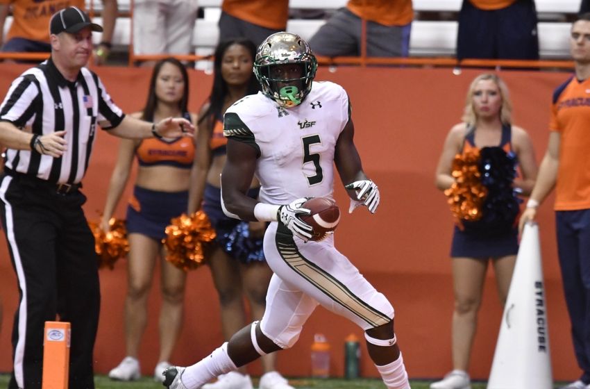 Sep 17, 2016; Syracuse, NY, USA; South Florida Bulls running back Marlon Mack (5) runs in for a touchdown during the third quarter of a game against the Syracuse Orange at the Carrier Dome. South Florida won the game 45-20. Mandatory Credit: Mark Konezny-USA TODAY Sports