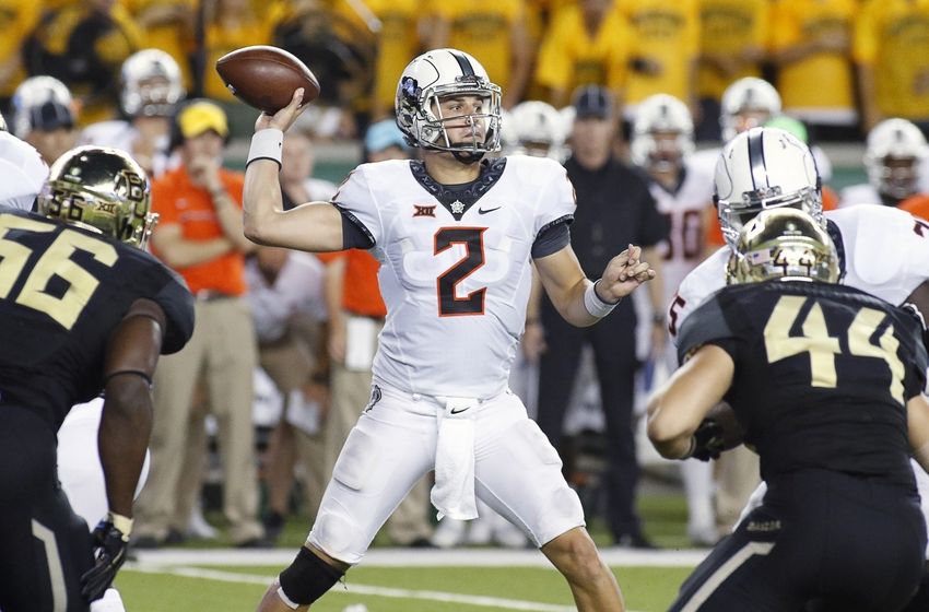 Sep 24, 2016; Waco, TX, USA; Oklahoma State Cowboys quarterback Mason Rudolph (2) passes the ball against the Baylor Bears during the second half at McLane Stadium. Baylor won 35-24. Mandatory Credit: Ray Carlin-USA TODAY Sports