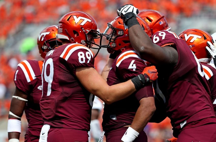 Sep 24, 2016; Blacksburg, VA, USA; Virginia Tech Hokies quarterback Jerod Evans (4) celebrates scoring a touchdown during the third quarter against the East Carolina Pirates at Lane Stadium. Mandatory Credit: Peter Casey-USA TODAY Sports