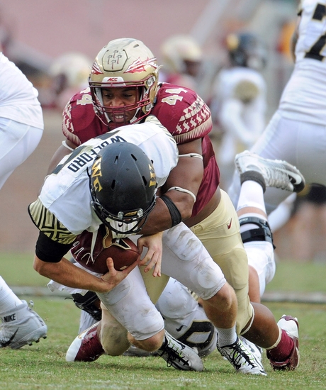 Oct 15, 2016; Tallahassee, FL, USA; Florida State Seminoles defensive end Demarcus Walker (44) sacks Wake Forest Demon Deacons quarterback John Wolford (10) during the game at Doak Campbell Stadium. Mandatory Credit: Melina Vastola-USA TODAY Sports