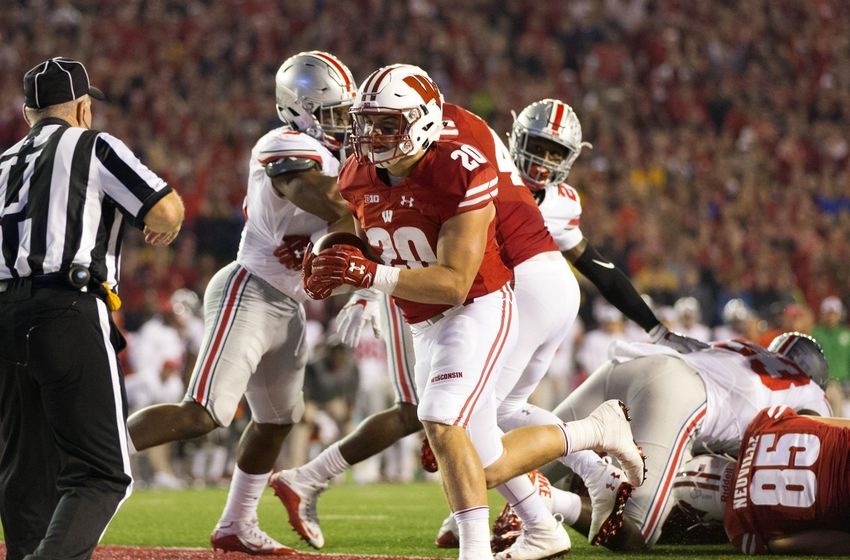 Oct 15, 2016; Madison, WI, USA; Wisconsin Badgers fullback Austin Ramesh (20) scores a touchdown during the fourth quarter against the Ohio State Buckeyes at Camp Randall Stadium. Ohio State won 30-23. Mandatory Credit: Jeff Hanisch-USA TODAY Sports