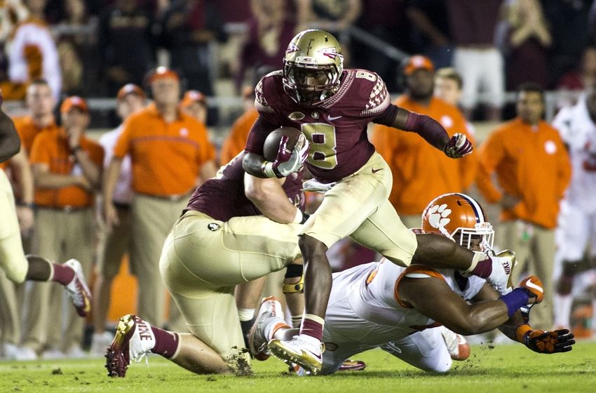 Oct 29, 2016; Tallahassee, FL, USA; Florida State Seminoles wide receiver Kermit Whitfield (8) picks up a first down during the first quarter against the Clemson Tigers at Doak Campbell Stadium. Mandatory Credit: Glenn Beil-USA TODAY Sports