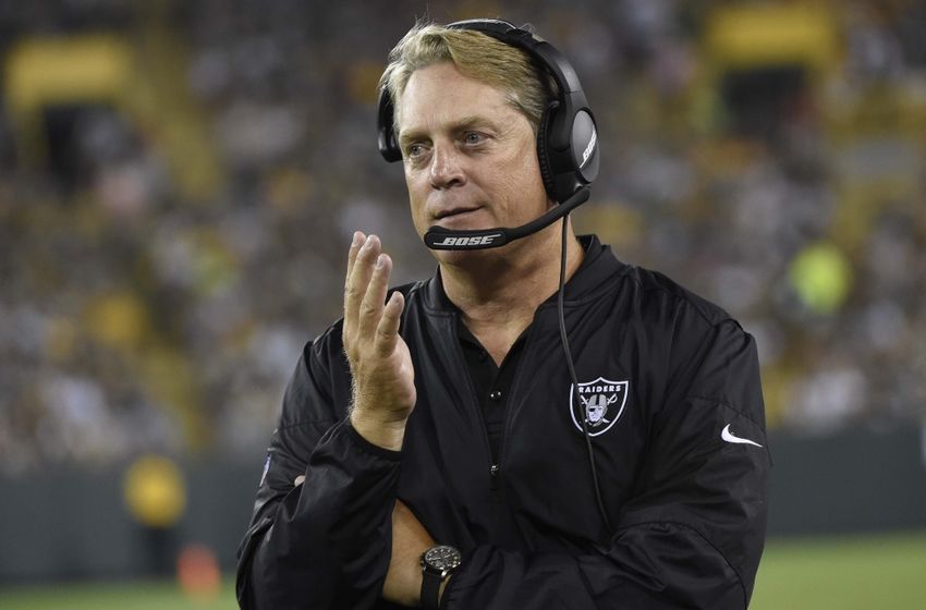 Aug 18, 2016; Green Bay, WI, USA; Oakland Raiders head coach Jack Del Rio calls a play in the third quarter during the game against the Green Bay Packers at Lambeau Field. Mandatory Credit: Benny Sieu-USA TODAY Sports