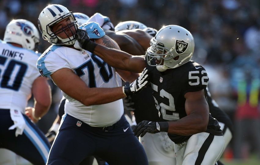 Aug 27, 2016; Oakland, CA, USA; Oakland Raiders defensive end Khalil Mack (52) attempts to rush past Tennessee Titans offensive tackle Jack Conklin (78) in the second quarter at Oakland Alameda Coliseum. Mandatory Credit: Cary Edmondson-USA TODAY Sports