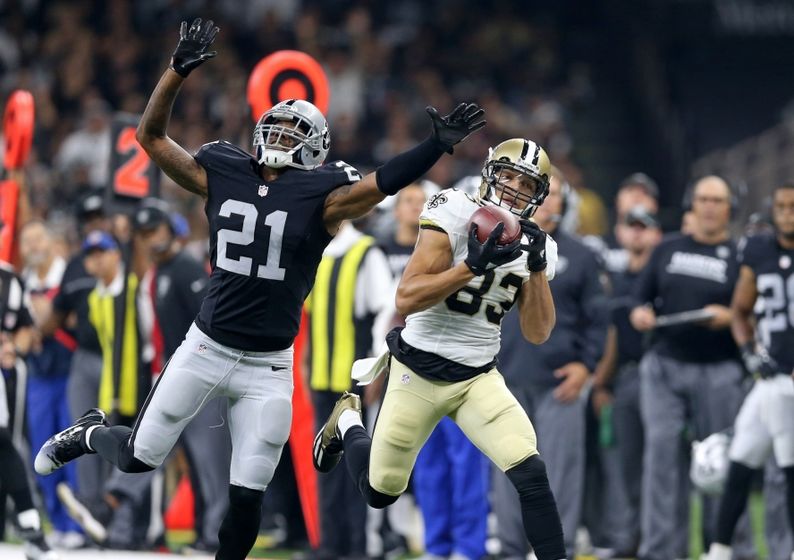 Sep 11, 2016; New Orleans, LA, USA; New Orleans Saints wide receiver Willie Snead (83) makes a catch while defended by Oakland Raiders defensive back Sean Smith (21) in the second quarter at the Mercedes-Benz Superdome. Mandatory Credit: Chuck Cook-USA TODAY Sports