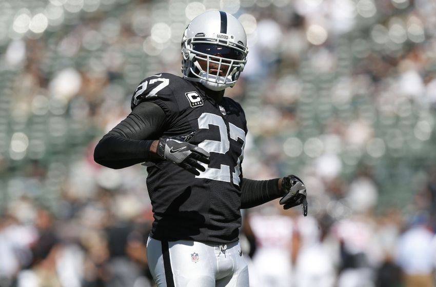 Sep 18, 2016; Oakland, CA, USA; Oakland Raiders free safety Reggie Nelson (27) stands on the field before the start of the game against the Atlanta Falcons at Oakland-Alameda County Coliseum. Mandatory Credit: Cary Edmondson-USA TODAY Sports