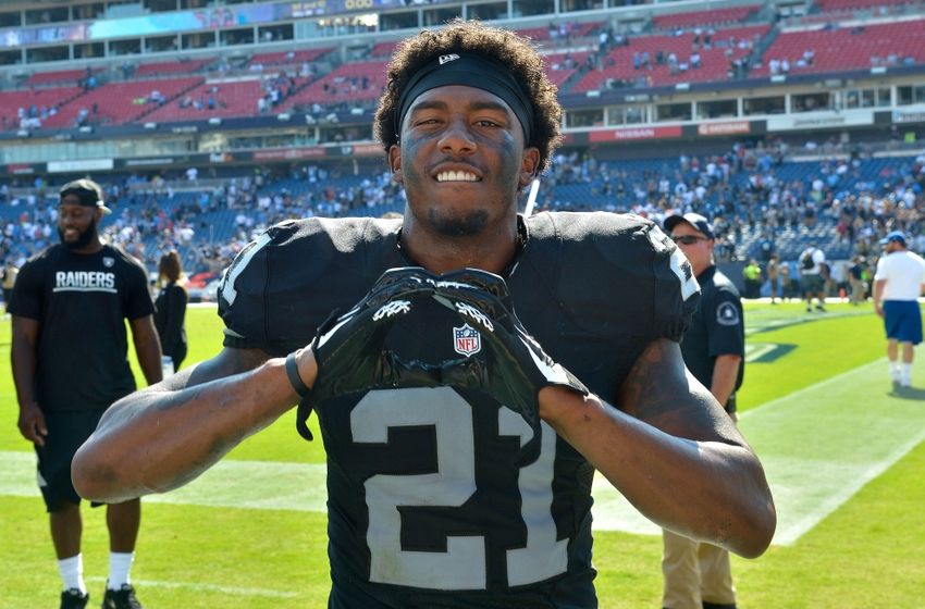 Sep 25, 2016; Nashville, TN, USA; Oakland Raiders cornerback Sean Smith (21) celebrates after defeating the Tennessee Titans 17-10 at Nissan Stadium. Mandatory Credit: Jim Brown-USA TODAY Sports