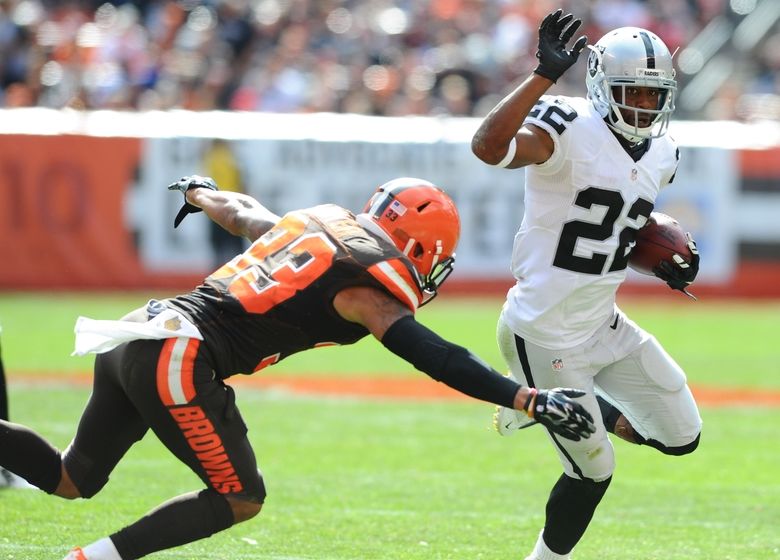 Sep 27, 2015; Cleveland, OH, USA; Cleveland Browns cornerback Joe Haden (23) Oakland Raiders running back Taiwan Jones (22) at FirstEnergy Stadium. Mandatory Credit: Ken Blaze-USA TODAY Sports