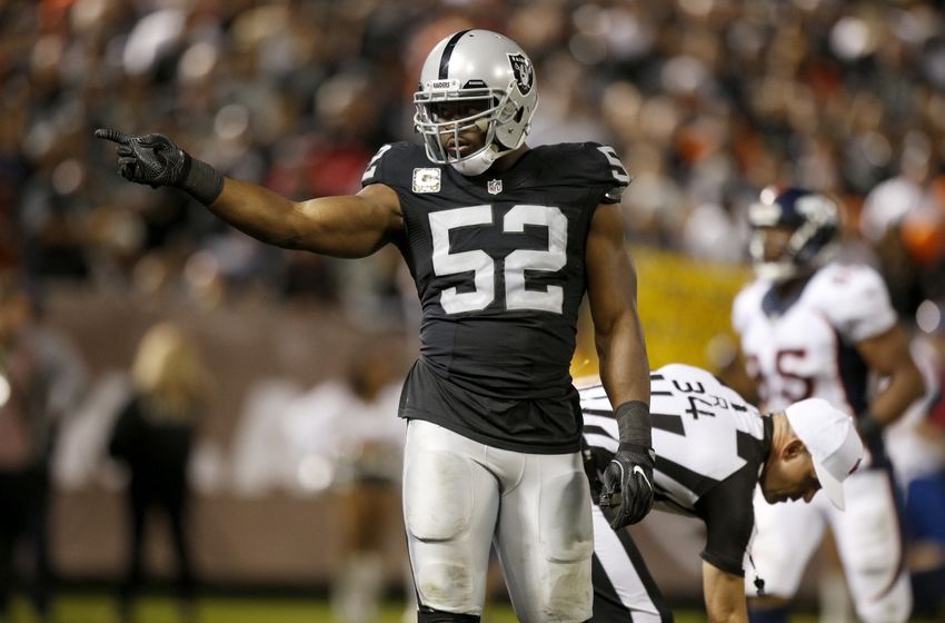 Nov 6, 2016; Oakland, CA, USA; Oakland Raiders defensive end Khalil Mack (52) points towards the crowd after a defensive stop against the Denver Broncos in the third quarter at Oakland Coliseum. The Raiders defeated the Broncos 30-20. Mandatory Credit: Cary Edmondson-USA TODAY Sports