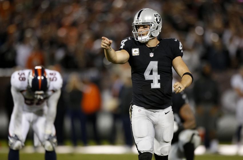 Nov 6, 2016; Oakland, CA, USA; Oakland Raiders quarterback Derek Carr (4) reacts after the Denver Broncos were called for a penalty in the fourth quarter at Oakland Coliseum. The Raiders defeated the Broncos 30-20. Mandatory Credit: Cary Edmondson-USA TODAY Sports