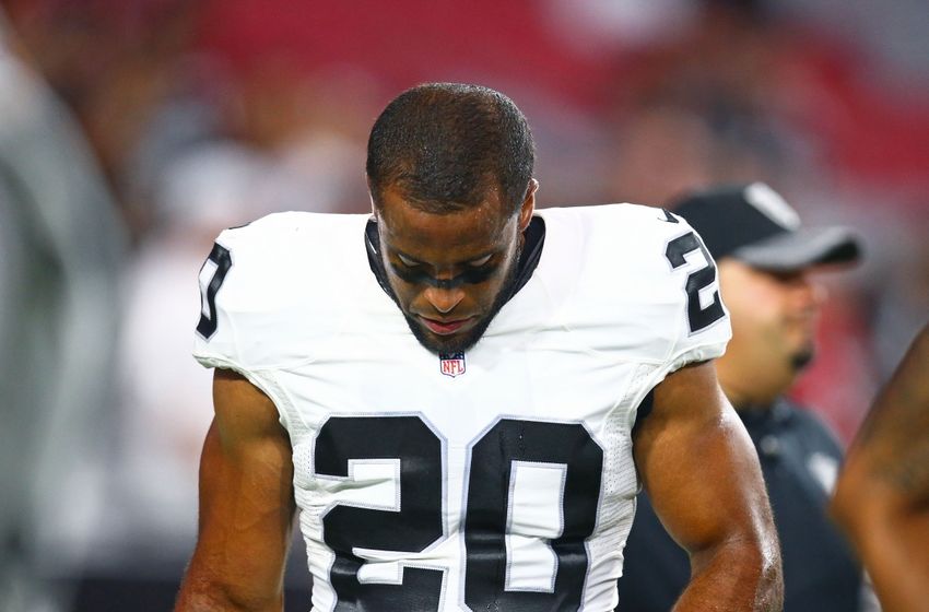 Aug 12, 2016; Glendale, AZ, USA; Oakland Raiders safety Nate Allen (20) reacts against the Arizona Cardinals during a preseason game at University of Phoenix Stadium. Mandatory Credit: Mark J. Rebilas-USA TODAY Sports