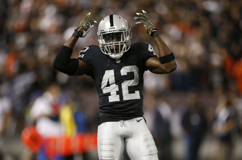 Nov 6, 2016; Oakland, CA, USA; Oakland Raiders strong safety Karl Joseph (42) gestures toward the crowd during a timeout against the Denver Broncos in the third quarter at Oakland Coliseum. The Raiders defeated the Broncos 30-20. Mandatory Credit: Cary Edmondson-USA TODAY Sports