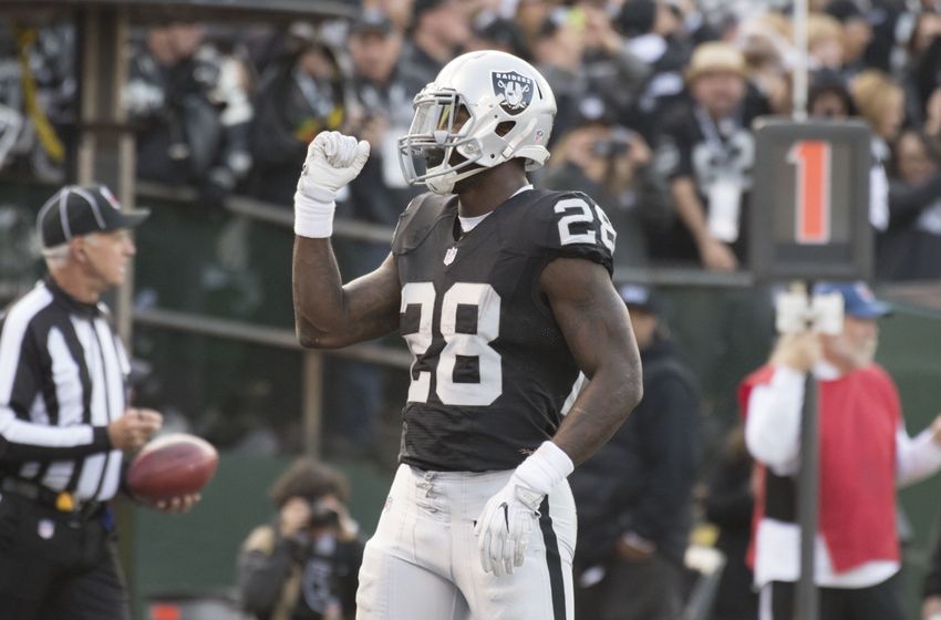 December 4, 2016; Oakland, CA, USA; Oakland Raiders running back Latavius Murray (28) celebrates after scoring a touchdown against the Buffalo Bills during the third quarter at Oakland Coliseum. The Raiders defeated the Bills 38-24. Mandatory Credit: Kyle Terada-USA TODAY Sports
