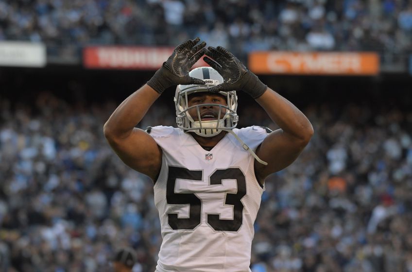 Dec 18, 2016; San Diego, CA, USA; Oakland Raiders linebacker Malcolm Smith (53) celebrates after a fumble recovery in the fourth quarter against the San Diego Chargers during a NFL football game at Qualcomm Stadium. The Raiders defeated the Chargers 19-16. Mandatory Credit: Kirby Lee-USA TODAY Sports