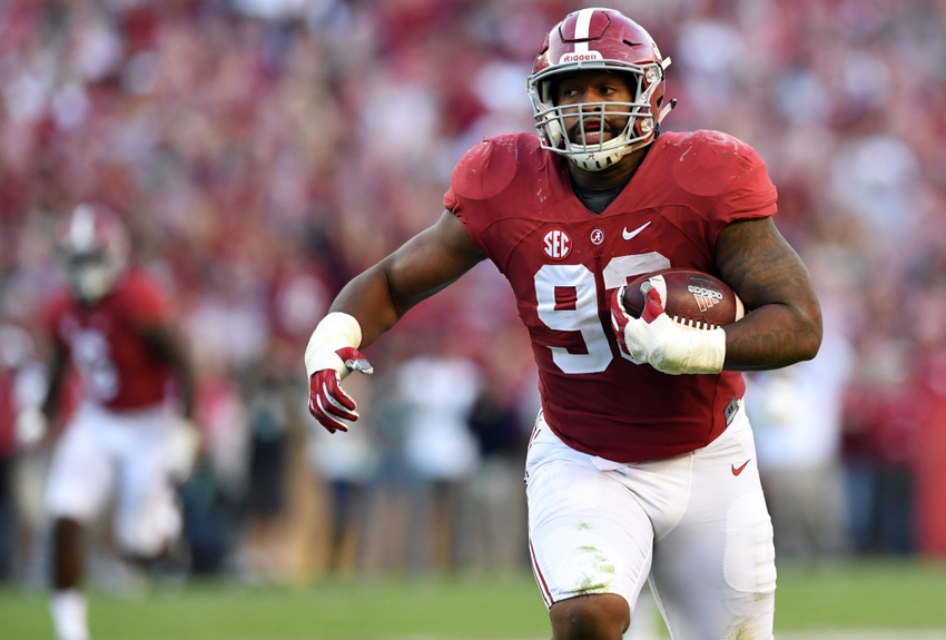 Oct 22, 2016; Tuscaloosa, AL, USA; Alabama Crimson Tide defensive lineman Jonathan Allen (93) returns a fumble for a touchdown against the Texas A&M Aggies during the third quarter at Bryant-Denny Stadium. Mandatory Credit: John David Mercer-USA TODAY Sports