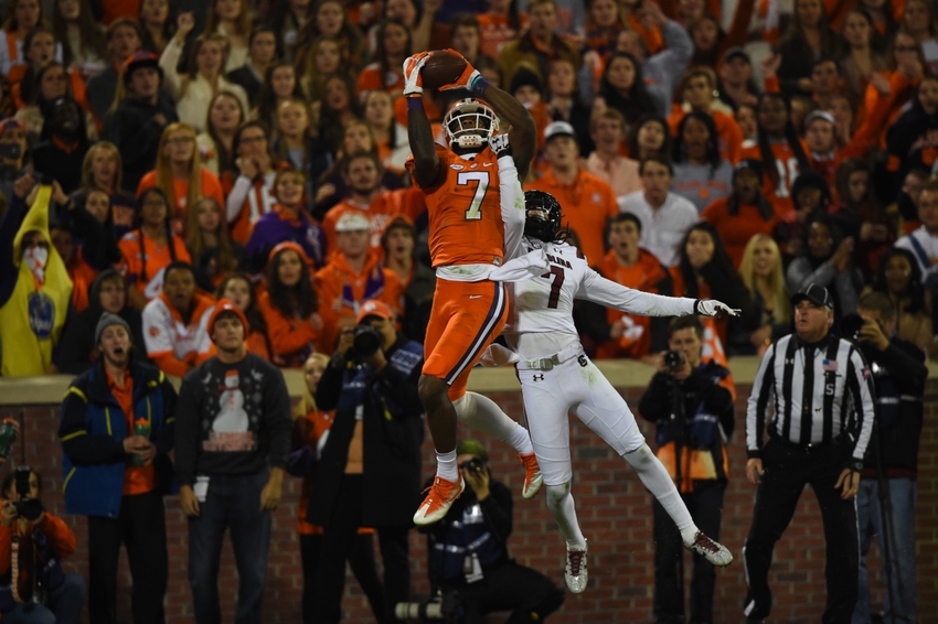Nov 26, 2016; Clemson, SC, USA; Clemson Tigers wide receiver Mike Williams (7) catches a touchdown pass in front of South Carolina Gamecocks defensive back Jamarcus King (7) at Clemson Memorial Stadium. Mandatory Credit: Tommy Gilligan-USA TODAY Sports