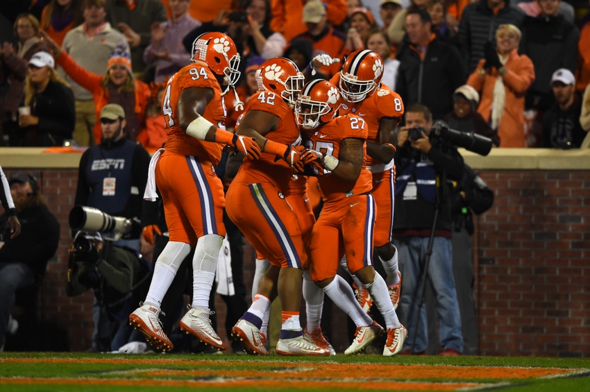 Nov 26, 2016; Clemson, SC, USA; Clemson Tigers running back C.J. Fuller (27) celebrates with teammates after scoring a touchdown during the third quarter against the South Carolina Gamecocks at Clemson Memorial Stadium. Mandatory Credit: Tommy Gilligan-USA TODAY Sports
