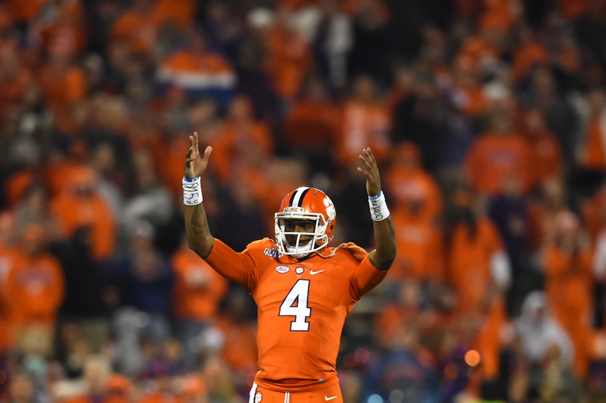 Nov 26, 2016; Clemson, SC, USA; Clemson Tigers quarterback Deshaun Watson (4) waves to the fans as he stands on the field during the fourth quarter against the South Carolina Gamecocks at Clemson Memorial Stadium. Clemson Tigers defeated South Carolina Gamecocks 56-7. Mandatory Credit: Tommy Gilligan-USA TODAY Sports