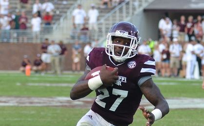 Sep 19, 2015; Starkville, MS, USA; Mississippi State Bulldogs running back Aeris Williams (27) runs the ball during the game against the Northwestern State Demons at Davis Wade Stadium. Mississippi State won 62-13. Mandatory Credit: Matt Bush-USA TODAY Sports