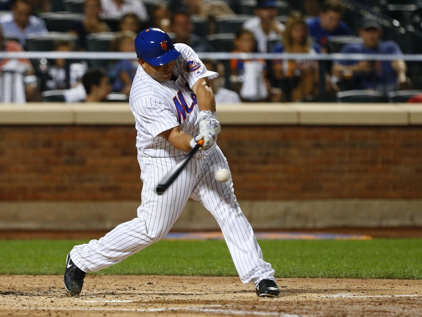 Aug 26, 2016; New York City, NY, USA; New York Mets starting pitcher Bartolo Colon (40) hits a double in the fifth inning against the Philadelphia Phillies at Citi Field. Mandatory Credit: Noah K. Murray-USA TODAY Sports