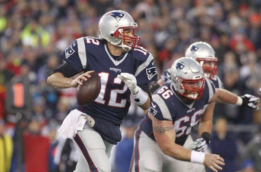 Jan 16, 2016; Foxborough, MA, USA; New England Patriots quarterback Tom Brady (12) looks to pass the ball against the Kansas City Chiefs during the first half in the AFC Divisional round playoff game at Gillette Stadium. Mandatory Credit: Stew Milne-USA TODAY Sports
