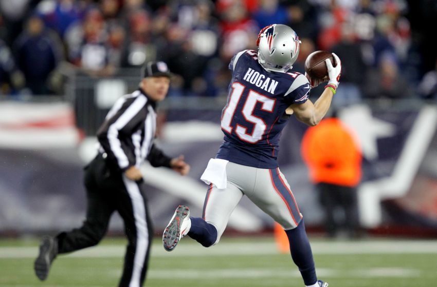 Dec 12, 2016; Foxborough, MA, USA; New England Patriots wide receiver Chris Hogan (15) catches a pass from New England Patriots quarterback Tom Brady (not seen) and runs for a touchdown agains the Baltimore Ravens during the second half at Gillette Stadium. Mandatory Credit: Stew Milne-USA TODAY Sports