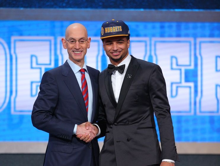 Jun 23, 2016; New York, NY, USA; Jamal Murray (Kentucky) greets NBA commissioner Adam Silver after being selected as the number seven overall pick to the Denver Nuggets in the first round of the 2016 NBA Draft at Barclays Center. Mandatory Credit: Brad Penner-USA TODAY Sports