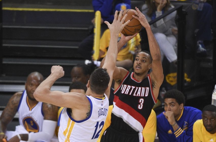 May 1, 2016; Oakland, CA, USA; Portland Trail Blazers guard C.J. McCollum (3) shoots the basketball against Golden State Warriors center Andrew Bogut (12) during the fourth quarter in game one of the second round of the NBA Playoffs at Oracle Arena. The Warriors defeated the Trail Blazers 118-106. Mandatory Credit: Kyle Terada-USA TODAY Sports