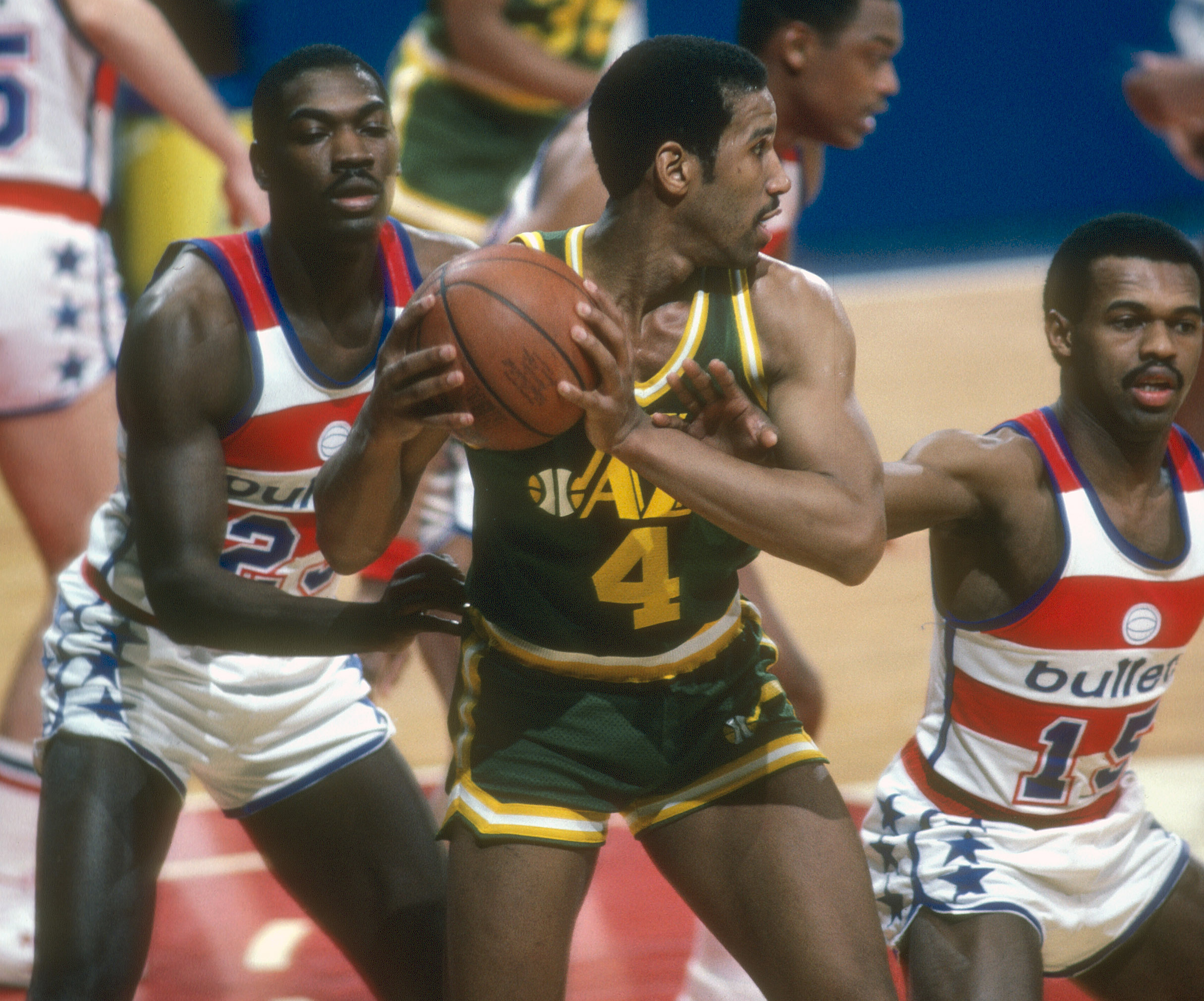 Adrian Dantley , accompanied by wife Dinitri and Utah Jazz owner News  Photo - Getty Images