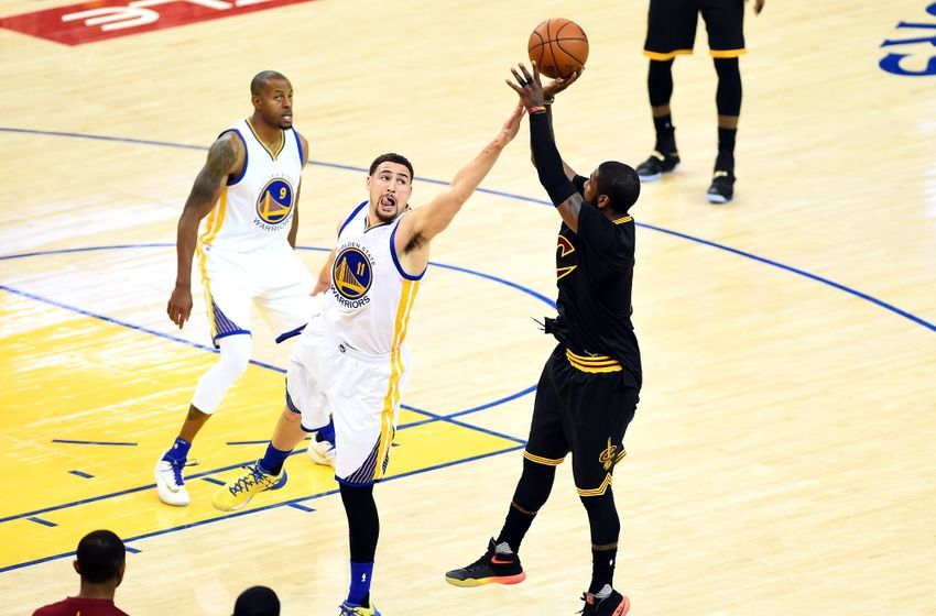 Jun 13, 2016; Oakland, CA, USA; Cleveland Cavaliers guard Kyrie Irving (2) shoots the ball against Golden State Warriors guard Klay Thompson (11) during the second quarter in game five of the NBA Finals at Oracle Arena. Mandatory Credit: Bob Donnan-USA TODAY Sports