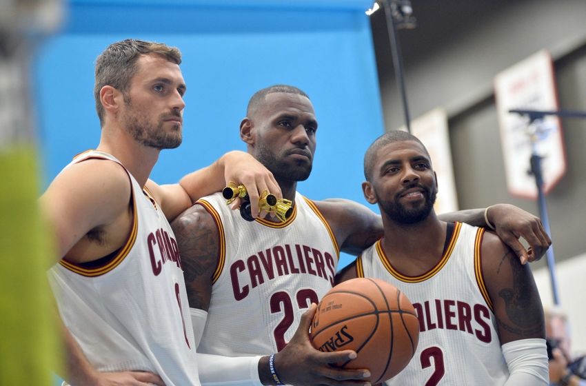 Sep 26, 2016; Cleveland, OH, USA; Cleveland Cavaliers forward Kevin Love (0), forward LeBron James (23) and guard Kyrie Irving (2) pose during a photo session during media day at Cleveland Clinic Courts. Mandatory Credit: Ken Blaze-USA TODAY Sports