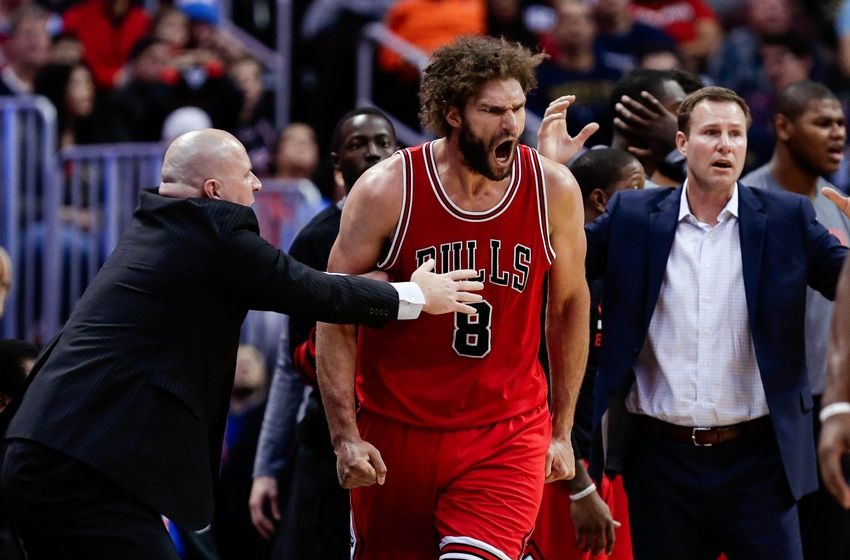 Nov 22, 2016; Denver, CO, USA; Chicago Bulls associate head coach Jim Boylan grabs center Robin Lopez (8) as he reacts to a play in the fourth quarter against the Denver Nuggets at the Pepsi Center. The Nuggets defeated the Bulls 110-107. Mandatory Credit: Isaiah J. Downing-USA TODAY Sports