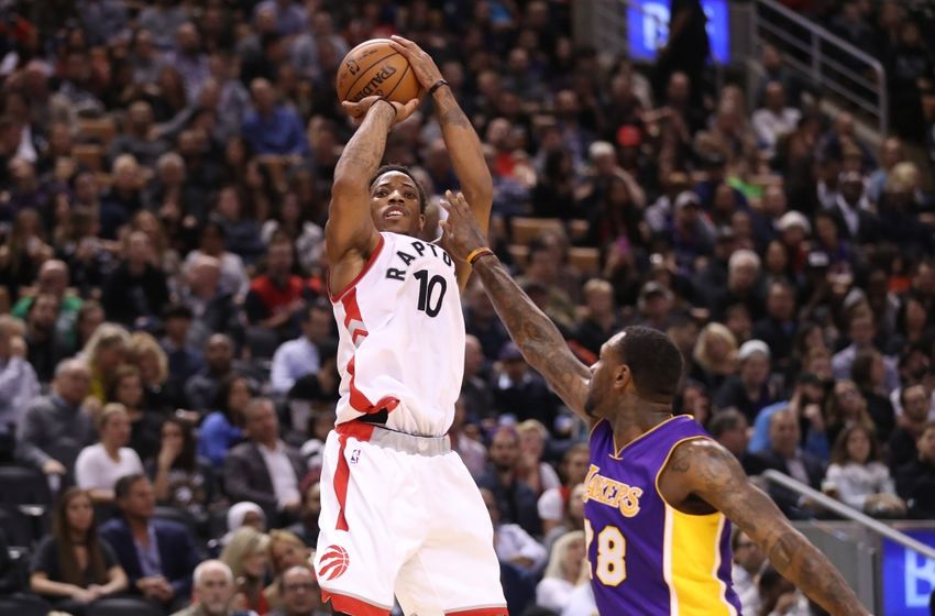 Dec 2, 2016; Toronto, Ontario, CAN; Toronto Raptors guard DeMar DeRozan (10) shoots and scores a basket against the Los Angeles Lakers at Air Canada Centre. The Raptors beat the Lakers 113-80. Mandatory Credit: Tom Szczerbowski-USA TODAY Sports
