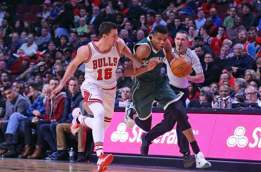 Dec 16, 2016; Chicago, IL, USA; Milwaukee Bucks forward Giannis Antetokounmpo (34) is fouled by Chicago Bulls forward Paul Zipser (16) during the second half at the United Center. Milwaukee won 95-69. Mandatory Credit: Dennis Wierzbicki-USA TODAY Sports