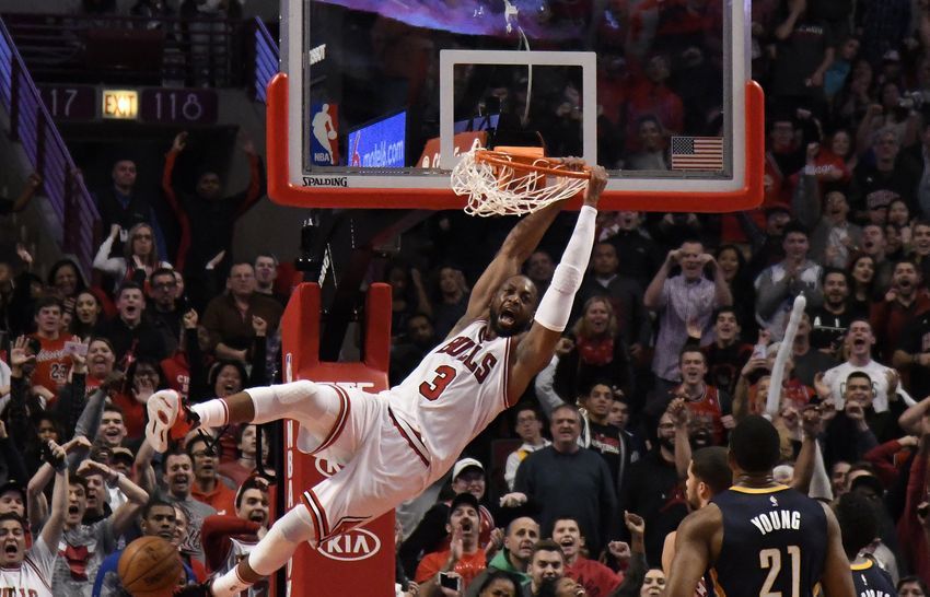 Dec 26, 2016; Chicago, IL, USA; Chicago Bulls guard Dwyane Wade (3) reacts after dunking against the Indiana Pacers in the final seconds of the game during the second half at the United Center. The Bulls won 90-85. Mandatory Credit: David Banks-USA TODAY Sports