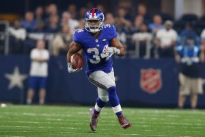 Sep 13, 2015; Arlington, TX, USA; New York Giants running back Shane Vereen (34) runs the ball against the Dallas Cowboys at AT&T Stadium. Dallas won 27-26. Mandatory Credit: Tim Heitman-USA TODAY Sports