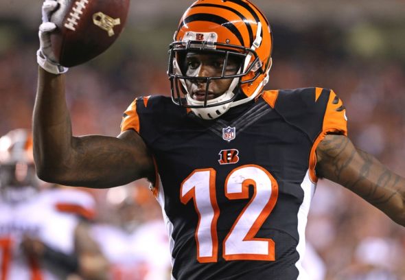 Nov 5, 2015; Cincinnati, OH, USA; Cincinnati Bengals wide receiver Mohamed Sanu (12) scores a touchdown on a pass from quarterback Andy Dalton (not pictured) in the second half against the Cleveland Browns at Paul Brown Stadium. The Bengals won 31-10. Mandatory Credit: Aaron Doster-USA TODAY Sports