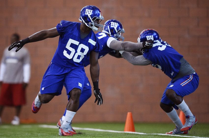 Jun 16, 2015; East Rutherford, NJ, USA; New York Giants defensive end Owa Odighizuwa (58) takes part in practice during minicamp at Quest Diagnostics Training Center. Mandatory Credit: Steven Ryan-USA TODAY Sports